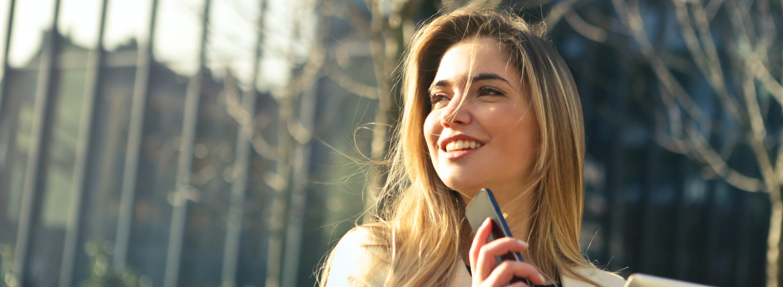 Century 21 Realty Services Real Estate Agent smiling after closing their first real estate deal